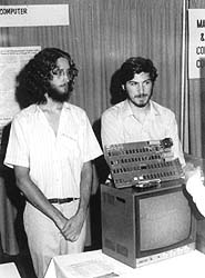 Dan Kottke and Steve Jobs at the Apple booth at an early computer show.
